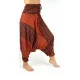 Stylish harem pants for both women and men with design stripes in orange