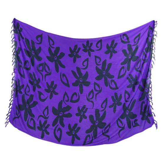 Lila strandsarong med blommigt tryck för sol och bad