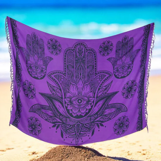 Purple sarong featuring black Hamsa hand symbols and fringe edges